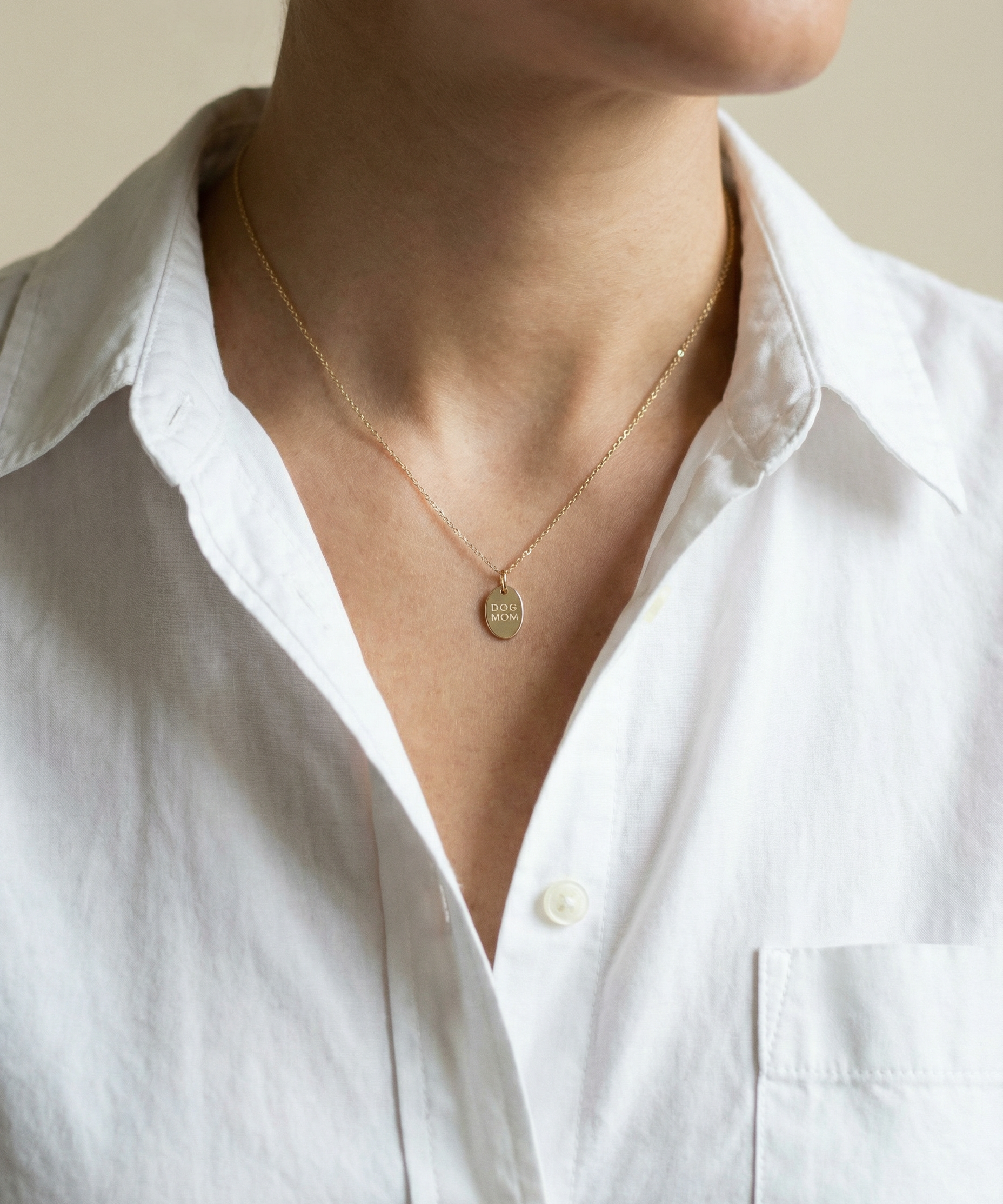 GeneratedwithKive.ai-Thenecklacemustappearattrue-to-lifescale_withaverysmall_understatedpendantappropriateforeverydayfinejewelry_verysmallanddainty_approximately8mmtall__delicateandpr.png